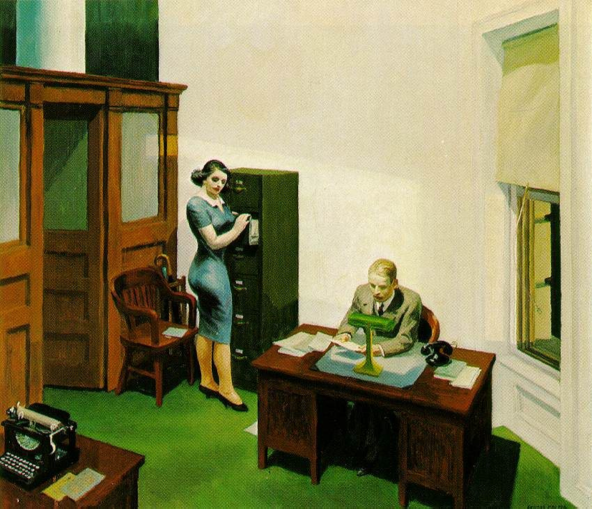 A dimly lit office interior where a woman looks through a file drawer while a man sits at a desk. The scene is quiet, distant, and emotionally restrained, evoking isolation in routine.